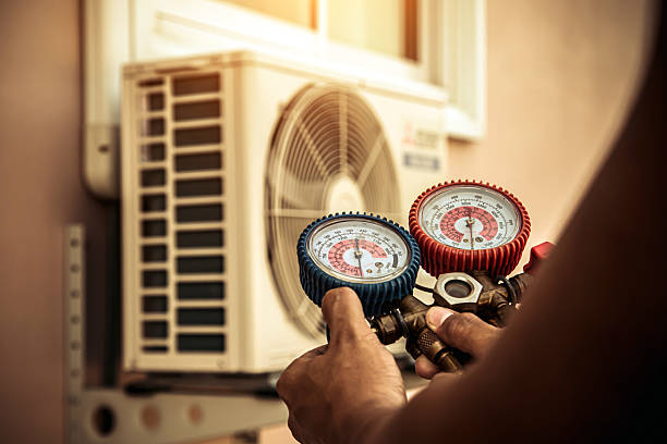 Professional Ac Installation technician working in Burket, IN